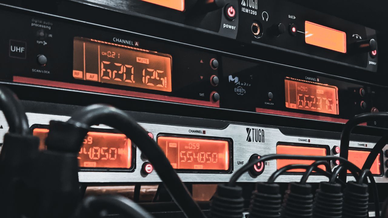 Detailed view of audio equipment and cables, perfect for sound engineering and recording themes.